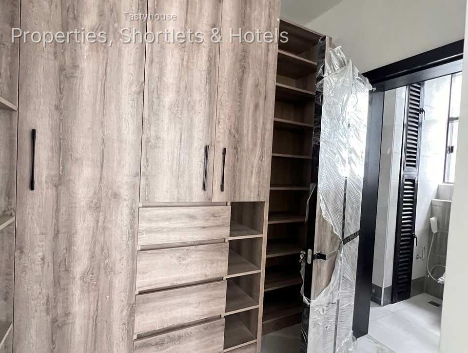A finished 4 bedroom semi detached housewith all rooms en-suite, fitted kitchen, boysquarters