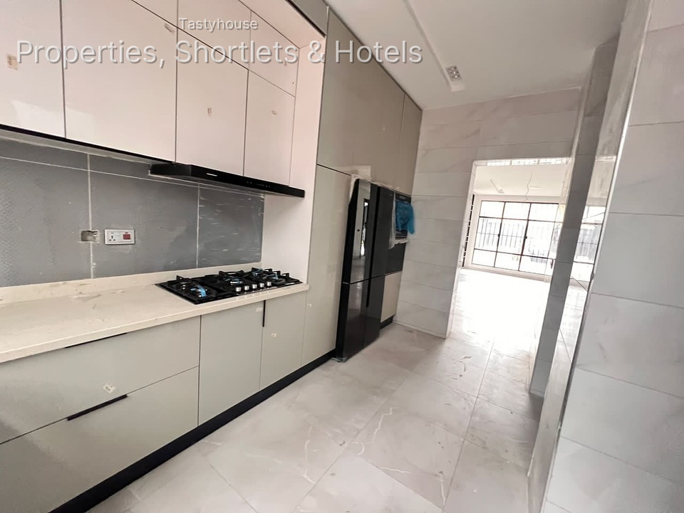 A finished 4 bedroom semi detached housewith all rooms en-suite, fitted kitchen, boysquarters