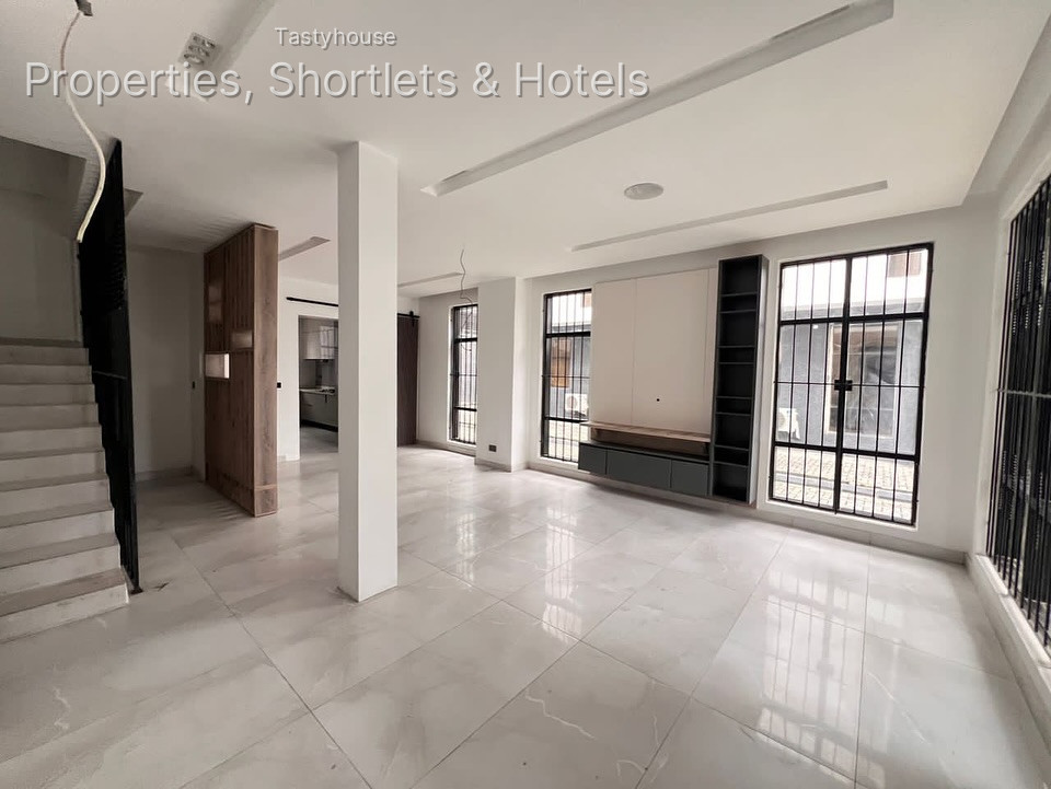 A finished 4 bedroom semi detached housewith all rooms en-suite, fitted kitchen, boysquarters