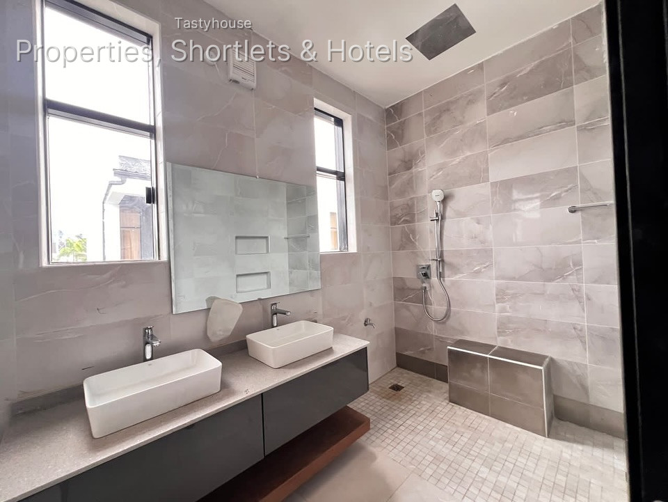 A finished 4 bedroom semi detached housewith all rooms en-suite, fitted kitchen, boysquarters
