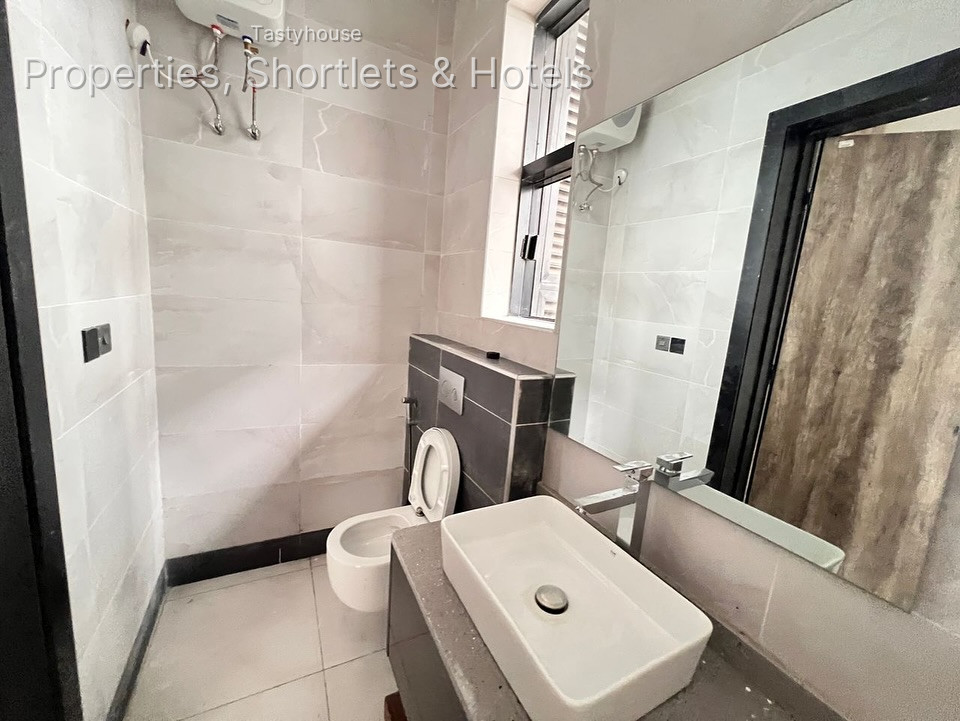 A finished 4 bedroom semi detached housewith all rooms en-suite, fitted kitchen, boysquarters