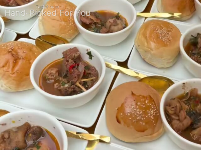 Goatmeat peppersoup and breadbun