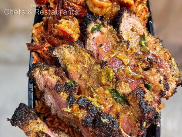 Jollof rice seasoned Cajun steak and buttery prawns