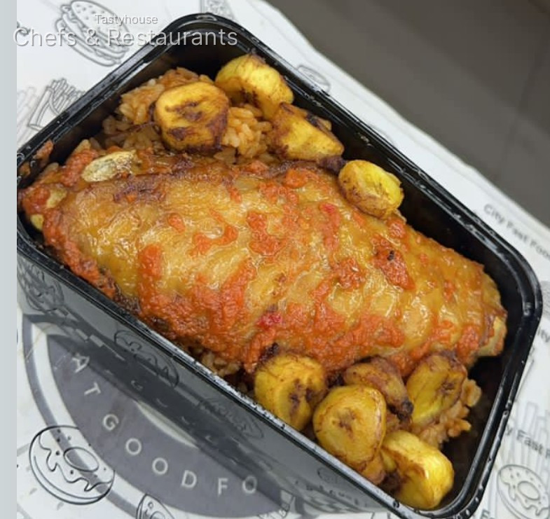 smokey jollof rice with turkey and plantain