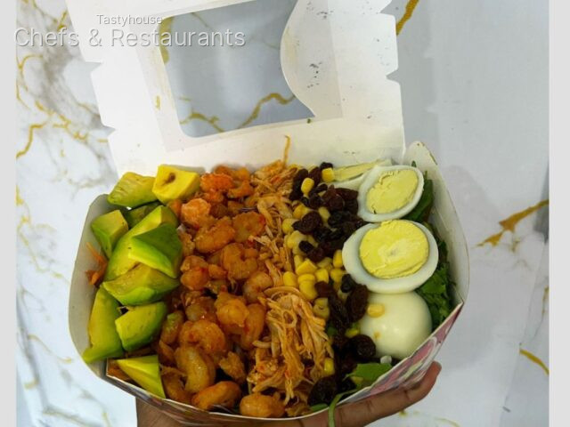 Shrimps chicken eggs and avocado salad