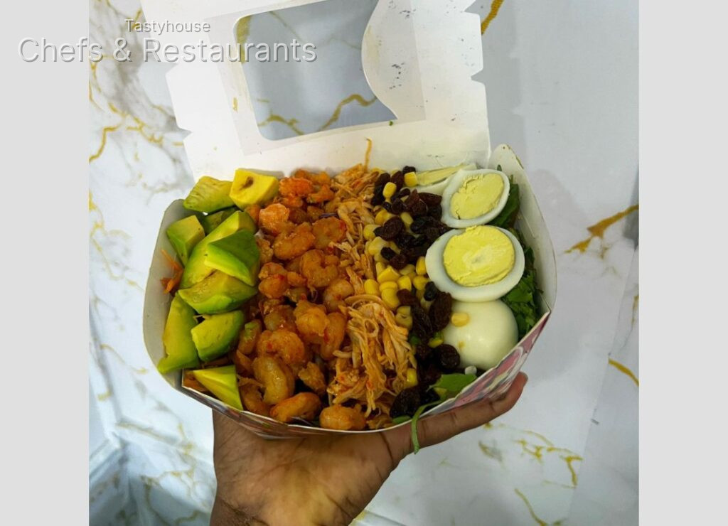 Shrimps chicken eggs and avocado salad