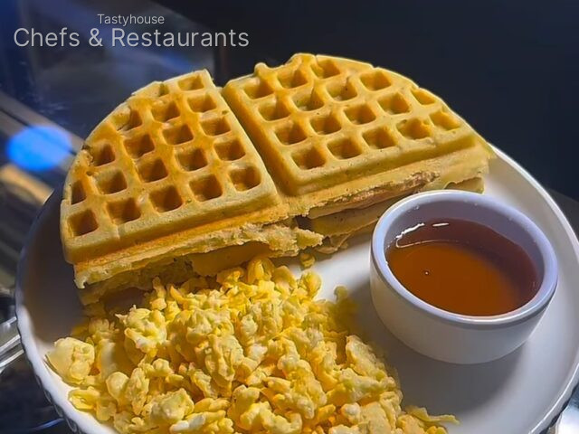 Fluffy waffles, soft scrambled eggs & a generous drizzle of syrup