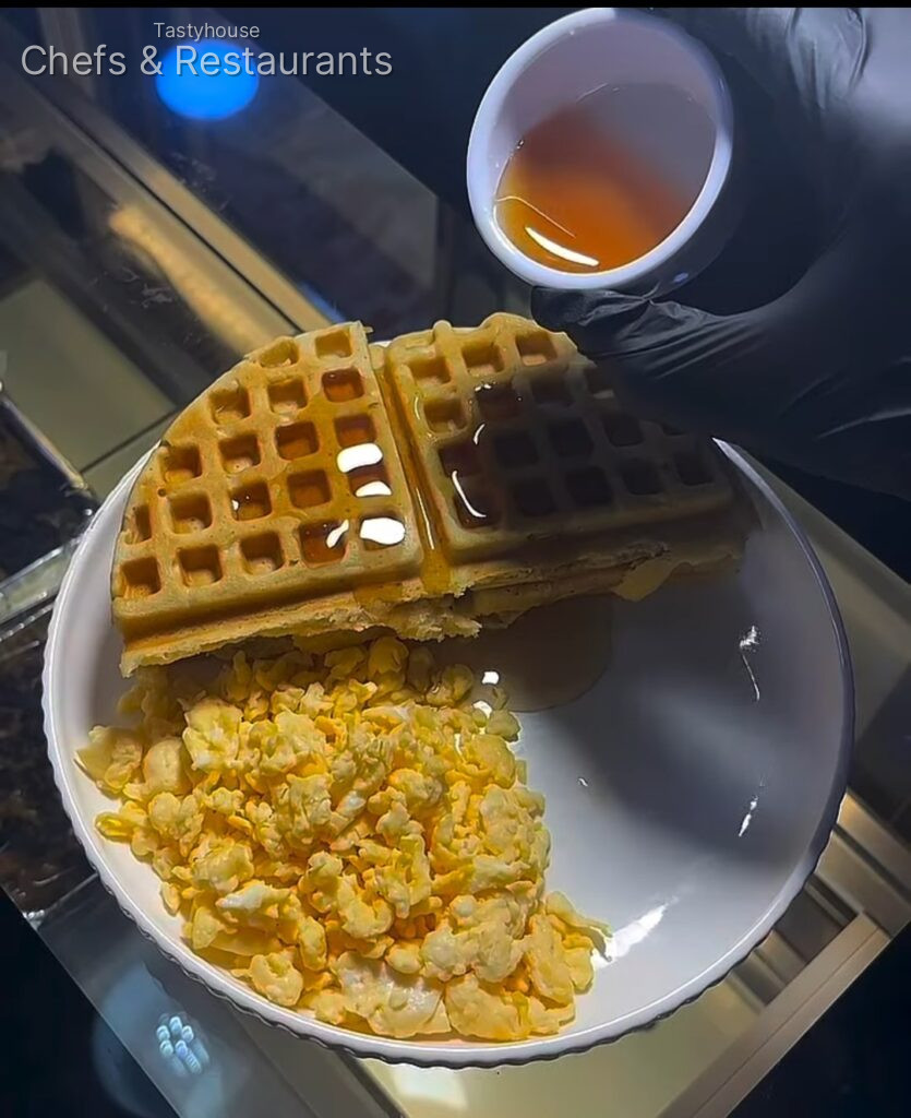 Fluffy waffles, soft scrambled eggs & a generous drizzle of syrup