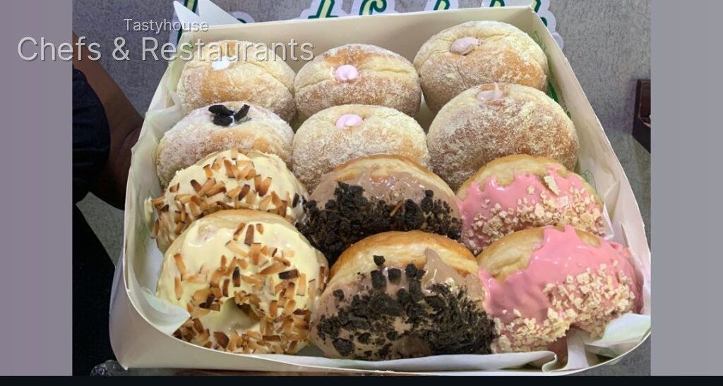 Combo of filled (milk dusted) and glazed donuts