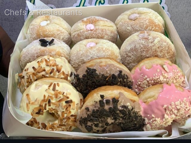 Combo of filled (milk dusted) and glazed donuts