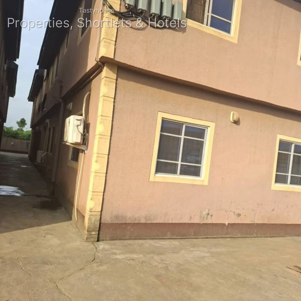8 UNITS OF 2 BEDR0OMS FLATS SITED ON A FULL PLOT OF LAND