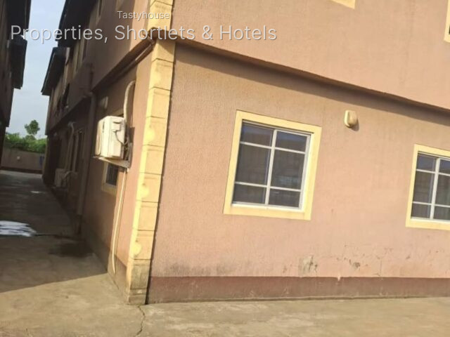 8 UNITS OF 2 BEDR0OMS FLATS SITED ON A FULL PLOT OF LAND