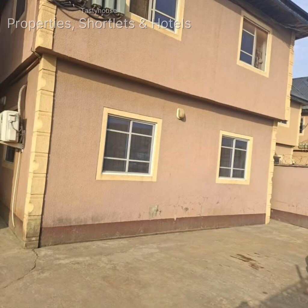 8 UNITS OF 2 BEDR0OMS FLATS SITED ON A FULL PLOT OF LAND