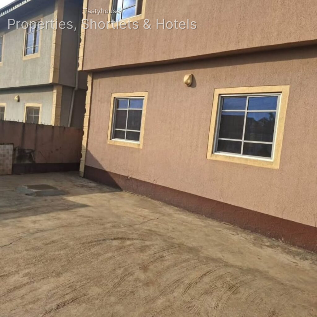 8 UNITS OF 2 BEDR0OMS FLATS SITED ON A FULL PLOT OF LAND