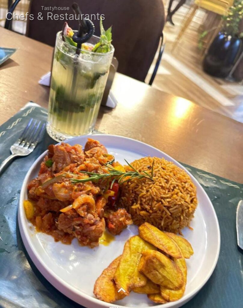 Chicken wings, jollof and potato wedges
