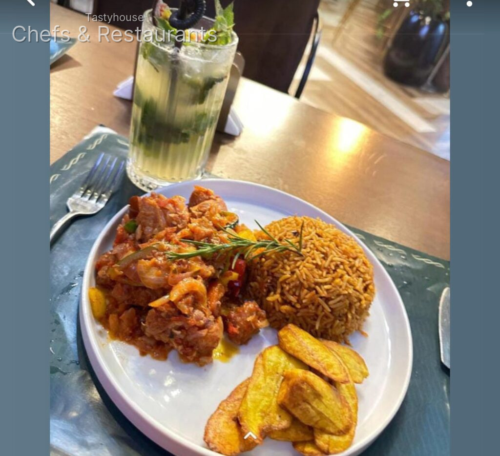 Chicken wings, jollof and potato wedges