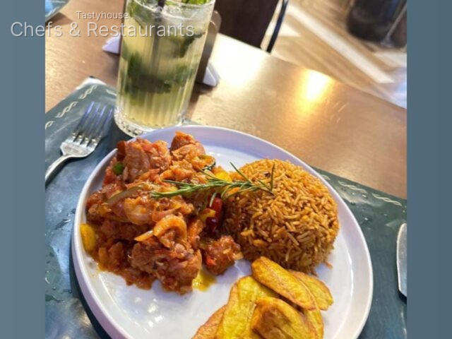 Chicken wings, jollof and potato wedges